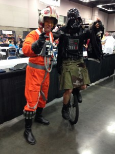 Rebel Pilot and Unicycle riding, bagpipe playing Darth Vader